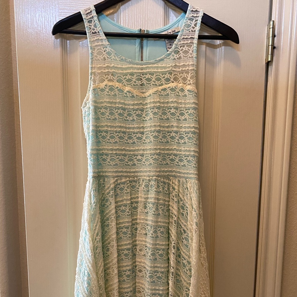 Blue A-line dress with white lace overlay